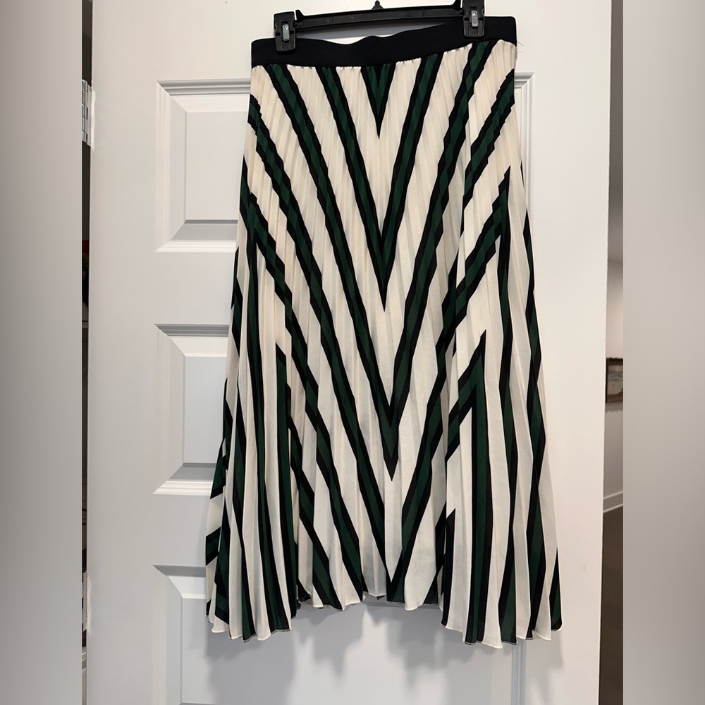 Pleated midi skirt with green and black chevron stripes